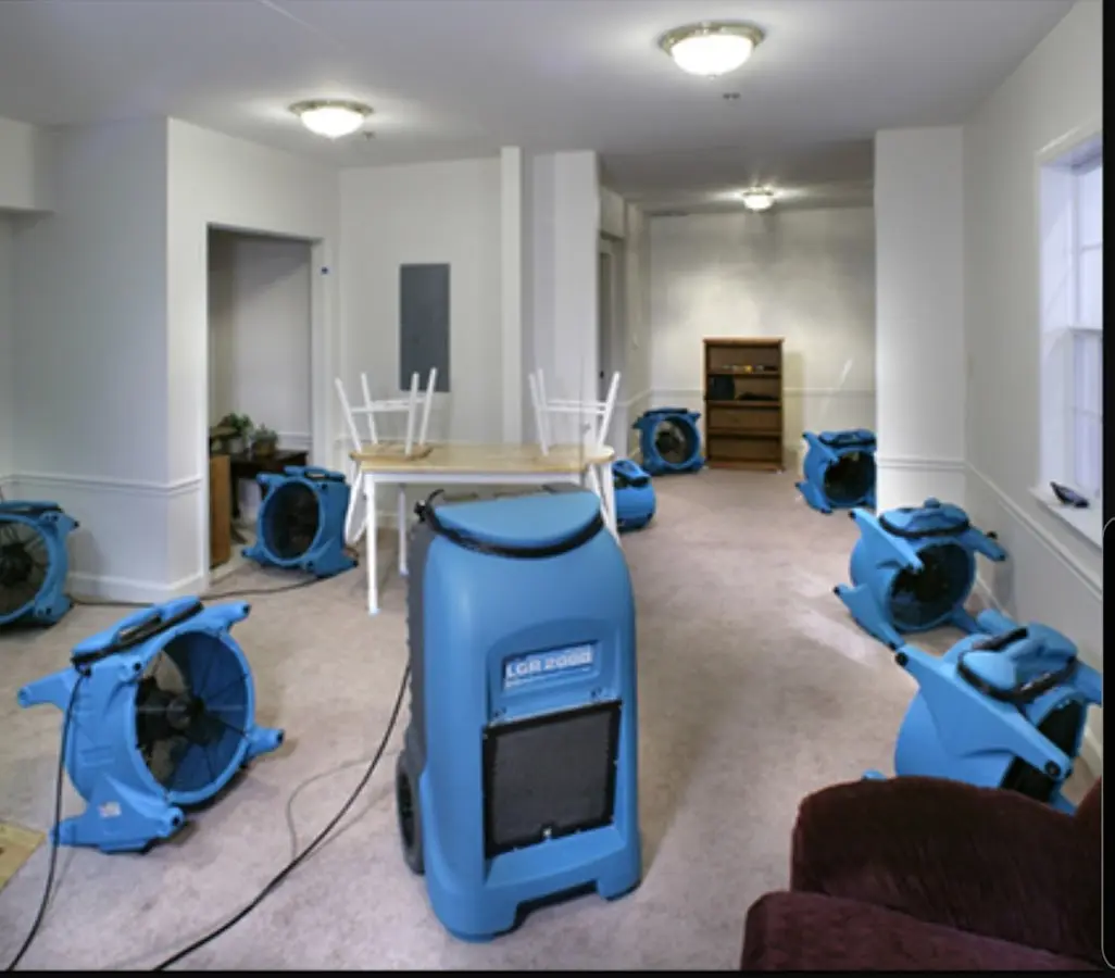 Air movers and dehumidifier setup for Water Damage Restoration in East Cleveland